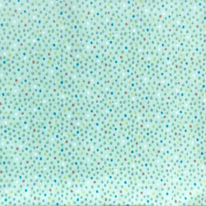 Coupon imprimé petits pois multi couleurs sur fond bleu vert clair