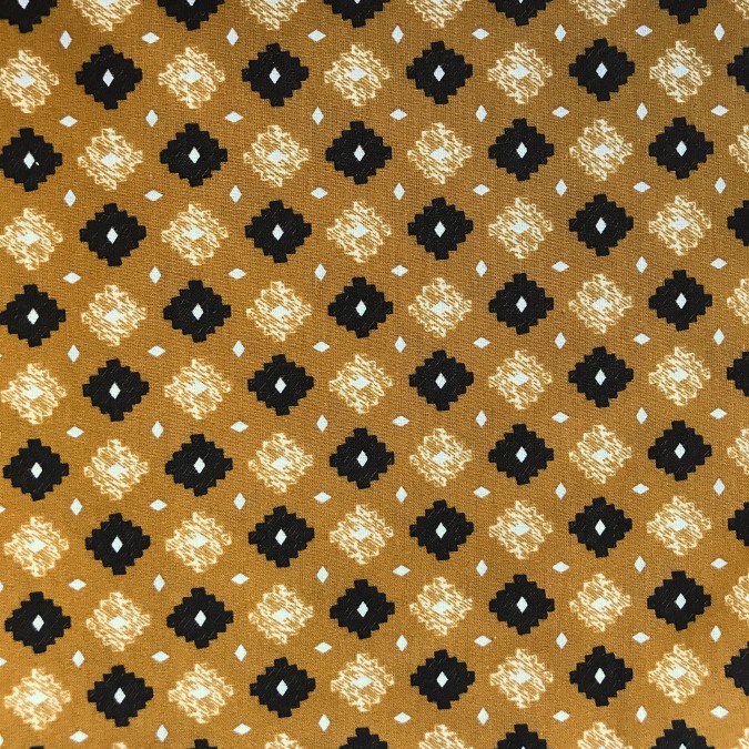 Coupon imprimé motif noir et jaune sur fond marron