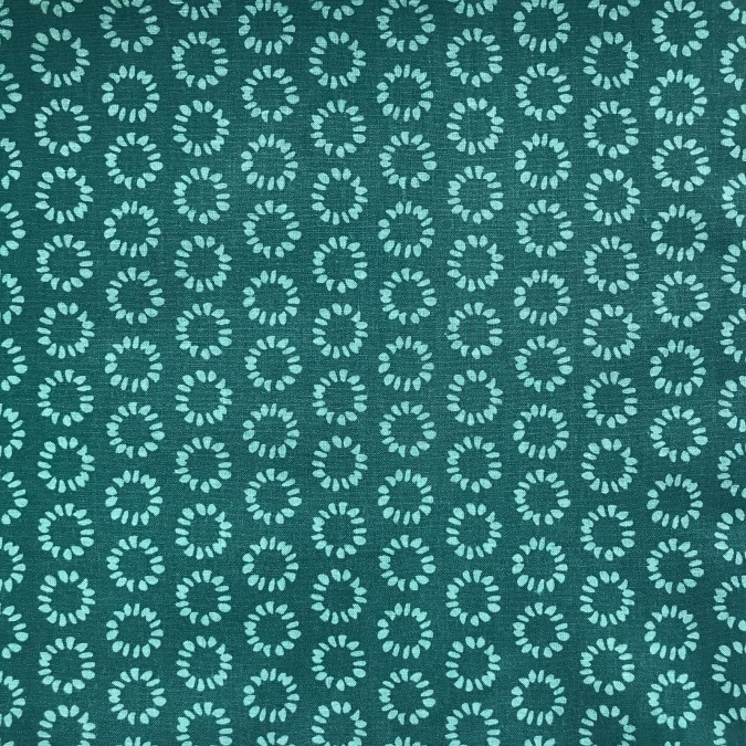 Coupon imprimé fleurs géométriques vertes clair sur fond vert foncé