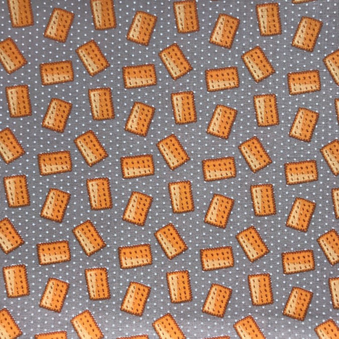 Coupon imprimé petits biscuits marron sur fond gris